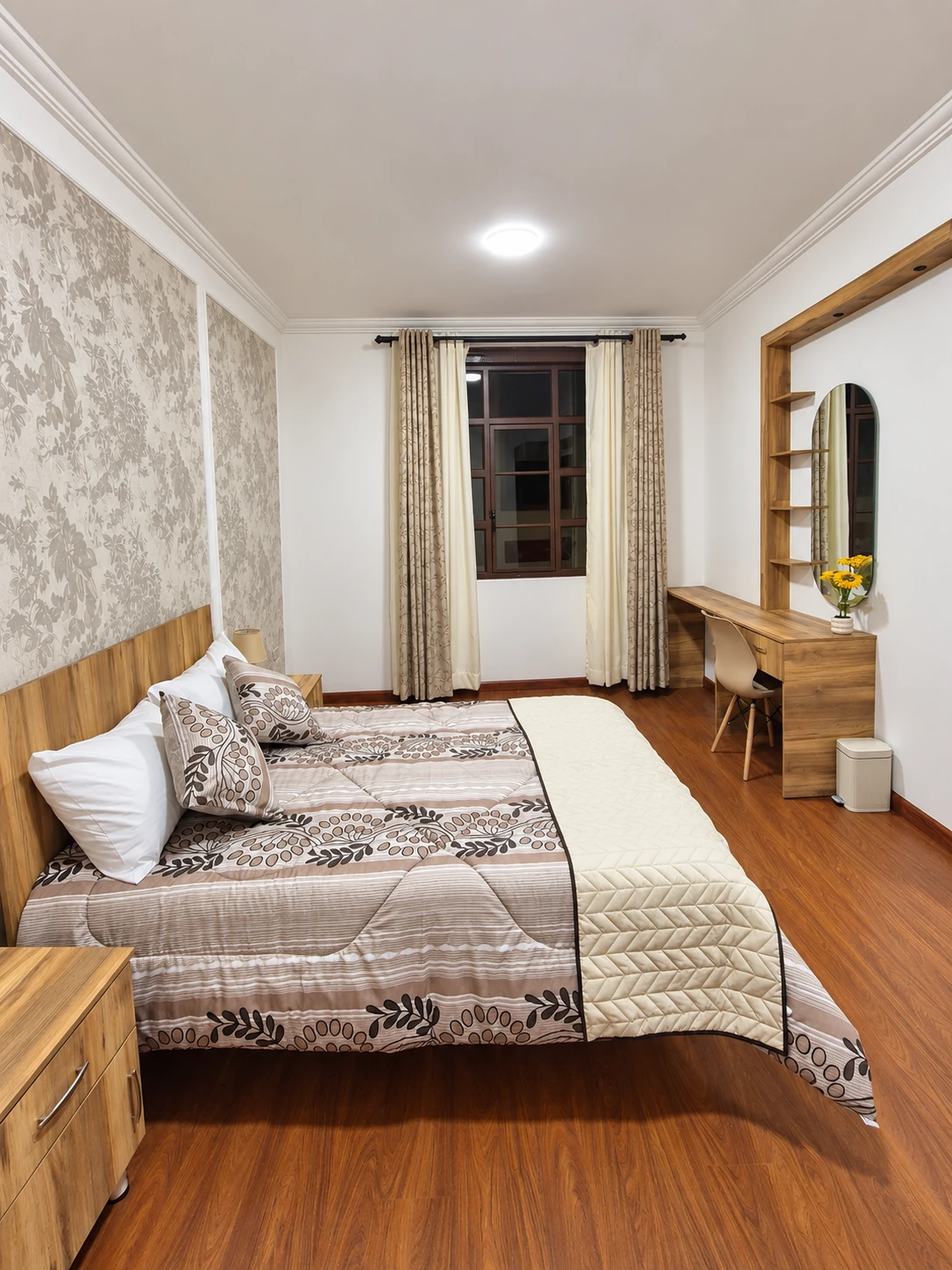 Habitación con cama doble y tocador del Departamento 01